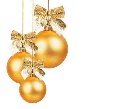 Three Gold Christmas Balls With Golden Bow