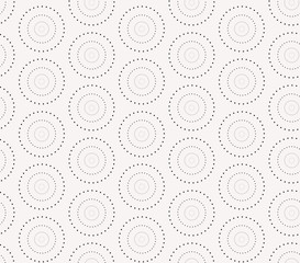 Seamless pattern with dotted circles. Vector repeating texture.