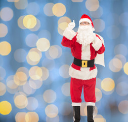 man in costume of santa claus with bag