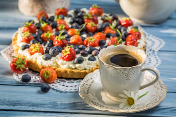 Coffee and fruit tarts served in the garden