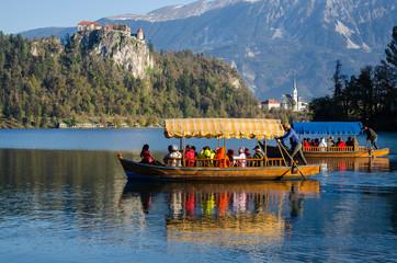 Pletna boats on the way to the Island on Lake Bled