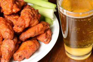 Buffalo Wings with Celery Sticks and Beer - 73699621