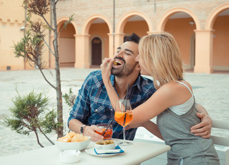 couple drinking aperitif in a Bar