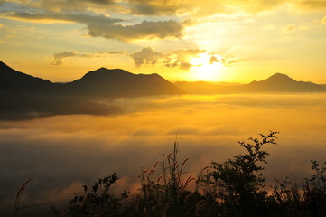 Fototapeta na wymiar Mountain Landscape in the Mist at Sunrise