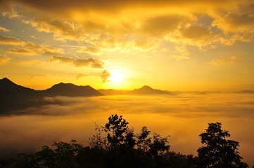Fototapeta na wymiar Mountain Landscape in the Mist at Sunrise