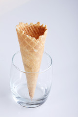 ice cream cones in clear glasses on white background