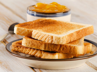 Toast bread on a  wooden table