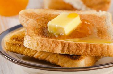 Slices toast bread on   wooden table