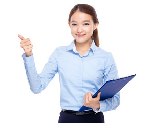 Business woman with clipboard and thumb up