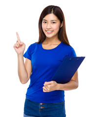 Young woman with clipboard and finger up