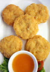 Fried Shrimp Cake on white dish.