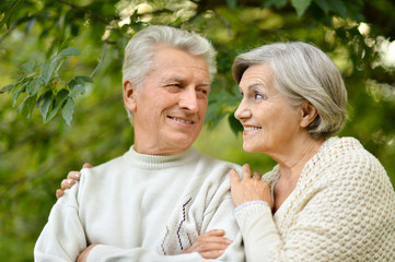 Mature couple in the autumn park