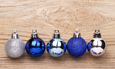 Blue Christmas Balls Over Wooden Background