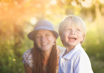 Mother and son playing outside