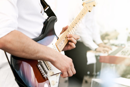 Guitarist playing an electric guitar