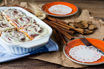 serve Cinnabon rolls with cinnamon and nuts on a plate