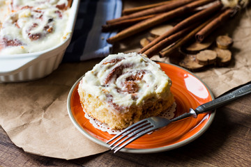serve Cinnabon rolls with cinnamon and nuts on a plate