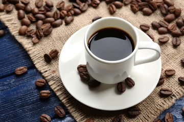 Cup of coffee on wooden table