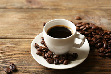 Cup of coffee on wooden table