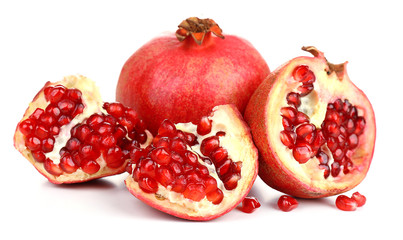 Juicy ripe pomegranates, isolated on white