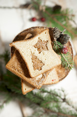 Chrismas breakfast - slice toast bread on wooden stump.