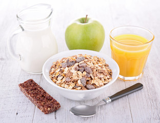 breakfast with cereal, milk and orange juice