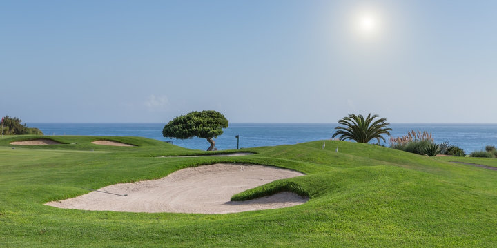 Panorama of a golf course on a sea background. for tourists.