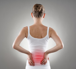 Loin spasm. Young woman with hurt backbone. - 73723868