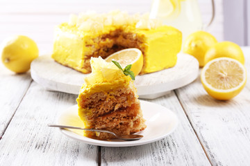 Tasty lemon dessert on wooden table