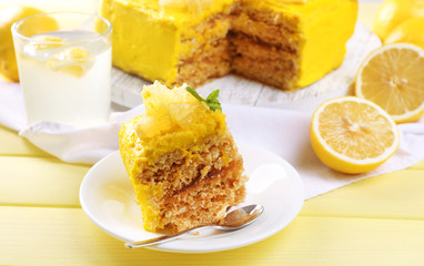 Tasty lemon dessert on wooden table