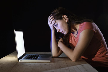worker student woman working with computer late night in stress