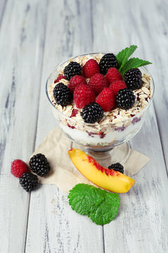 Healthy breakfast - yogurt with  fresh fruit, berries and
