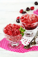 Closeup of cherry granita in glass bowls,