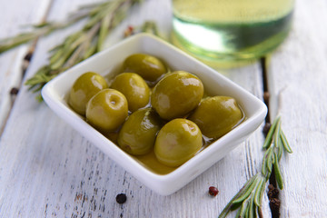 Marinated olives on table close-up
