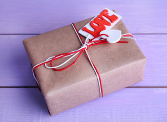 Gift box on wooden background