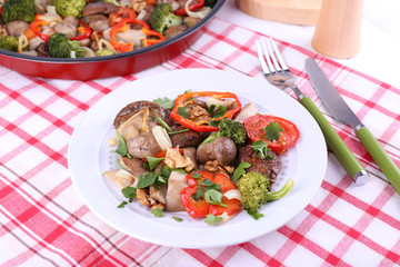 Braised wild mushrooms with vegetables and spices in pan and