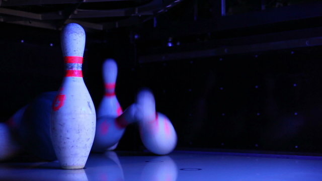 ball rolling bowls in a bowling alley