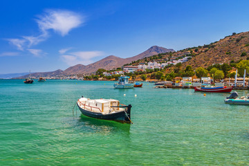 Fishing boats on the blue lagoon of Crete, Greece