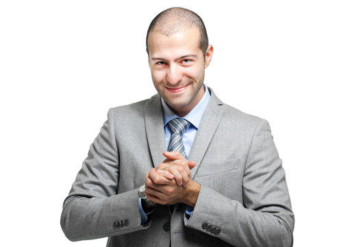 Satisfied businessman on white background