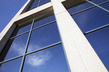 Fototapeta na wymiar facade of office building with blue sky