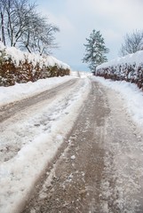 Obraz na płótnie Canvas idilic winter road rural area