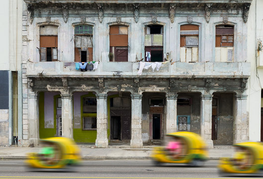 Fun moto taxi on a street of Havana, Cuba