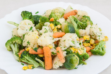 cooked vegetables in white plate
