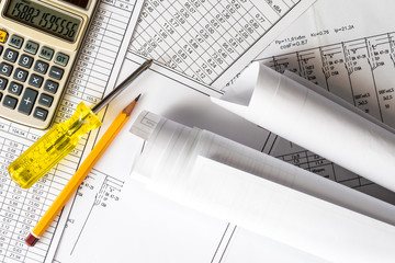 Rolls of drawings and tools for sketching and repair