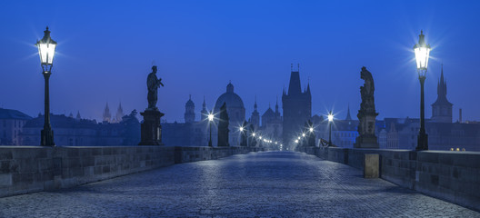 Naklejka premium blue twilight on Karluv bridge in Prague