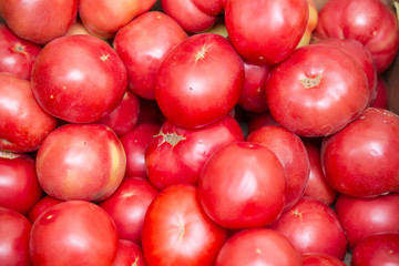 background of ripe red tomatoes