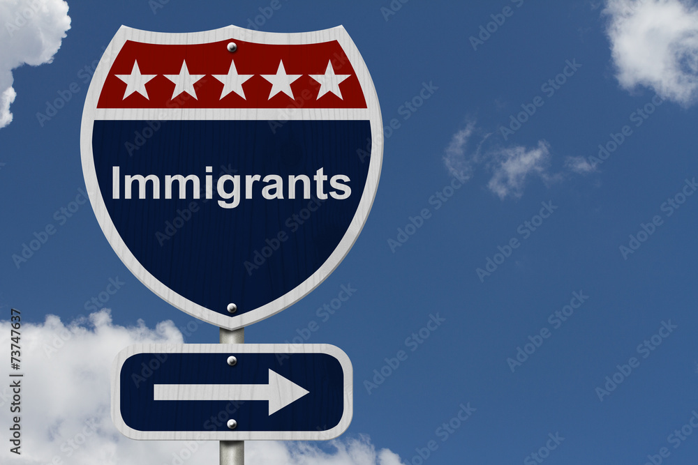 Wall mural Immigrants this way sign