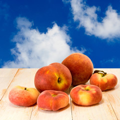 peach on blue sky background