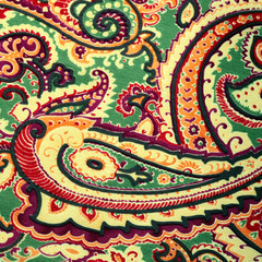 Traditional paisley pattern silk background