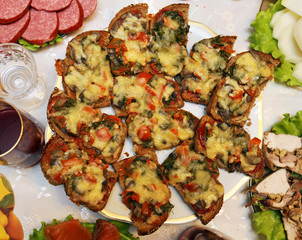 Delicious sandwiches with mushrooms and cheese